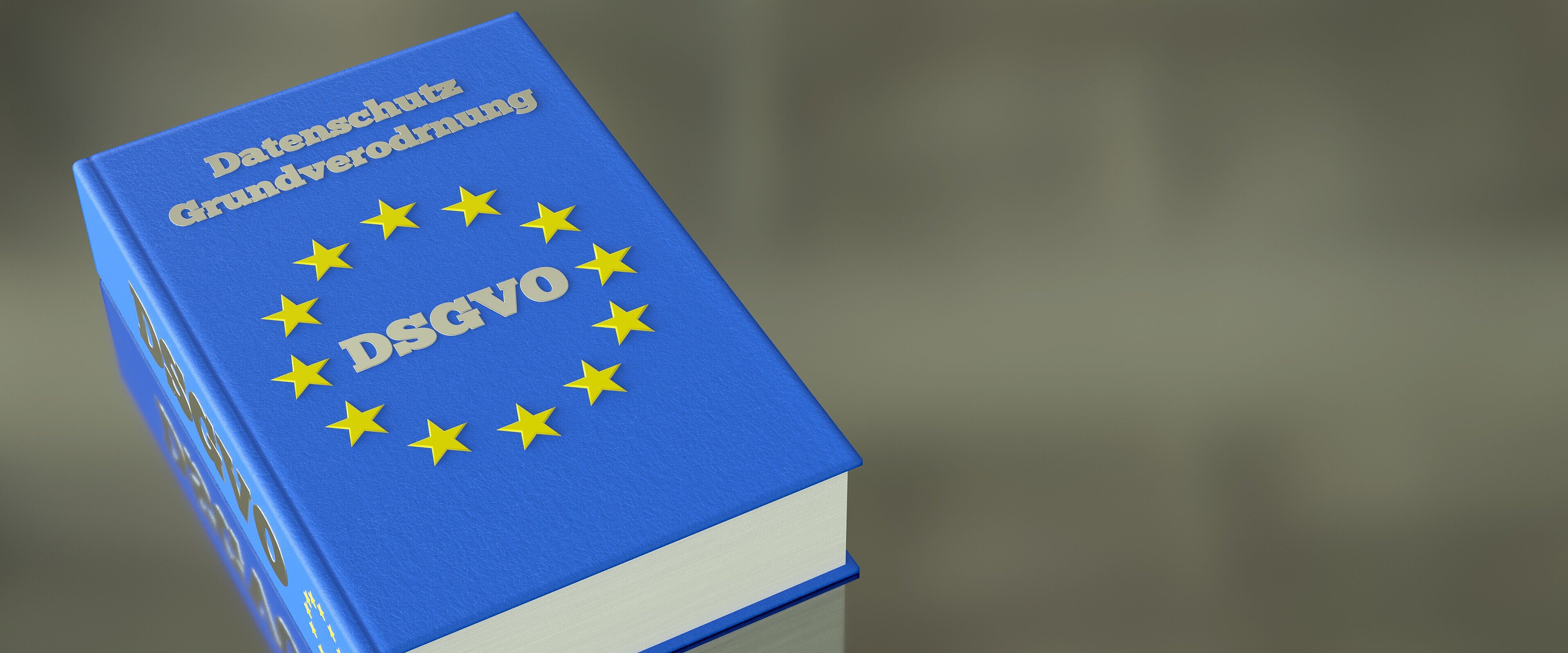 Buch zur Datenschutz-Grundverordnung (DSGVO) mit europäischer Flagge.