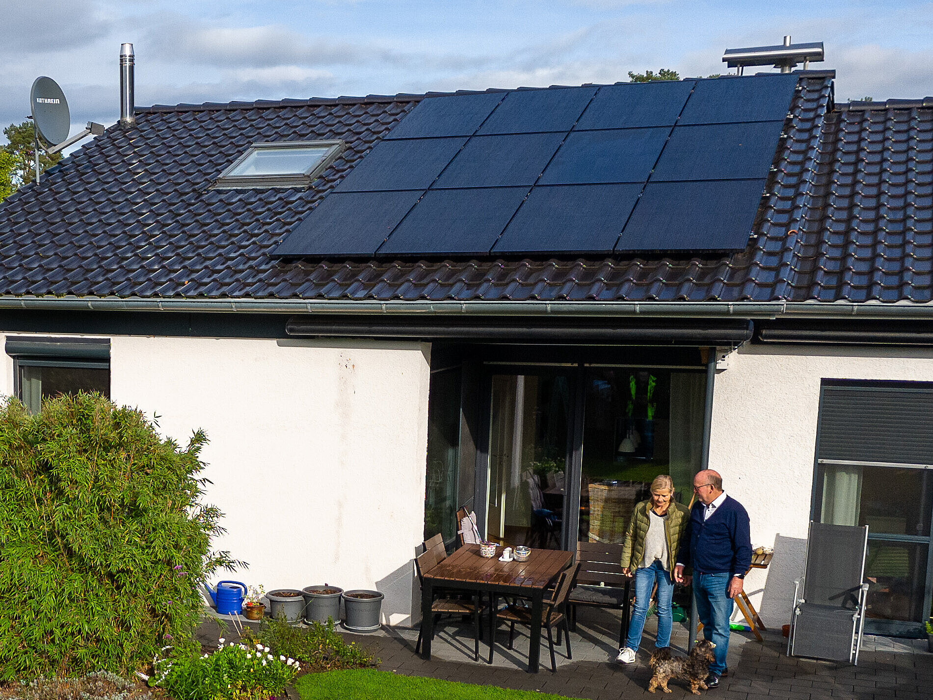 Haus eines Kunden mit einer Photovoltaikanlage auf dem Dach